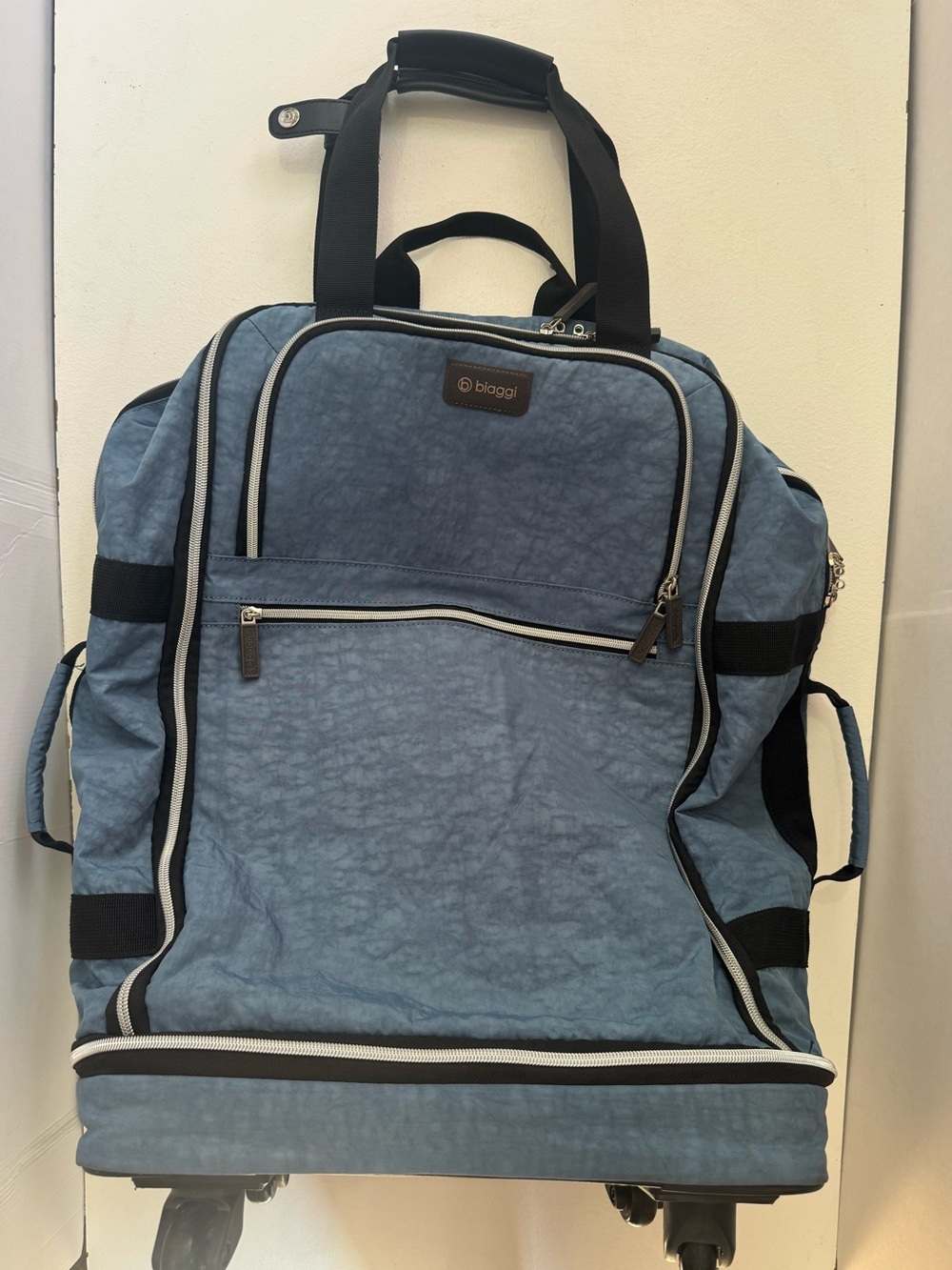 Biaggi Zipsak Boost Blue Spinner Expands 22" Rolling Underseat Carry On Luggage